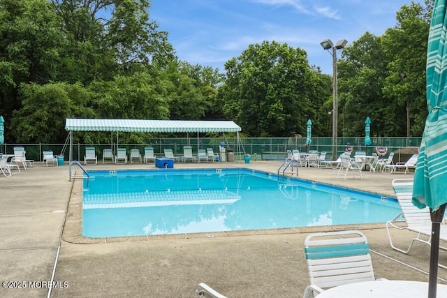 239 Medford Ct Unit B, Manalapan, NJ 07726 - community pool with a patio area