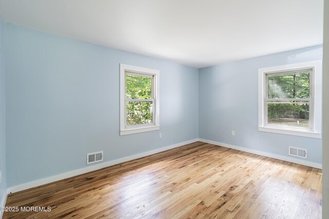 271 S Stump Tavern Rd, Jackson, NJ 08527 - empty room featuring wood finished floors and baseboards