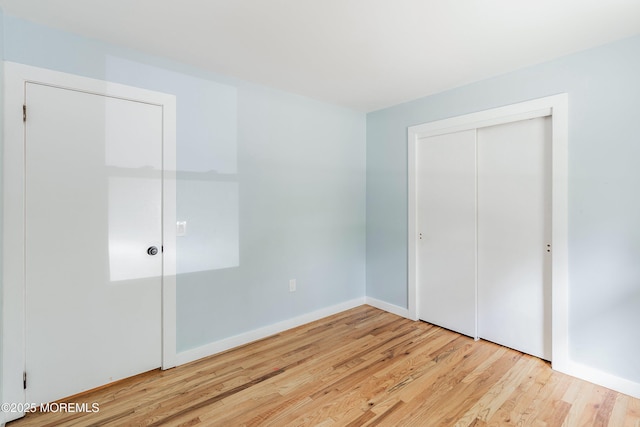 271 S Stump Tavern Rd, Jackson, NJ 08527 - unfurnished bedroom featuring wood finished floors and a closet