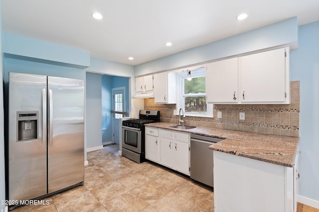271 S Stump Tavern Rd, Jackson, NJ 08527 - kitchen with stainless steel appliances, white cabinets, backsplash, under cabinet range hood, and recessed lighting