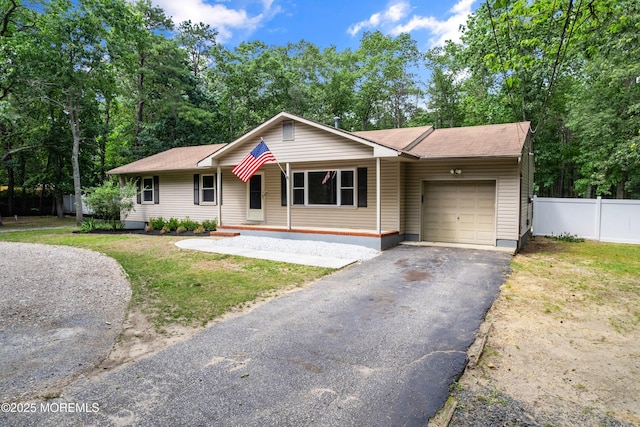271 S Stump Tavern Rd, Jackson, NJ 08527 - single story home with an attached garage, asphalt driveway, and roof with shingles