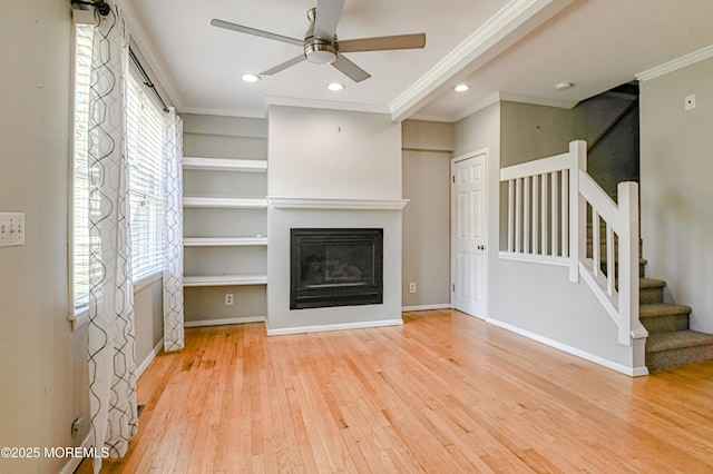 48 Washington Ave, Leonardo, NJ 07737 - unfurnished living room featuring wood finished floors, ceiling fan, stairway, crown molding, and built in features