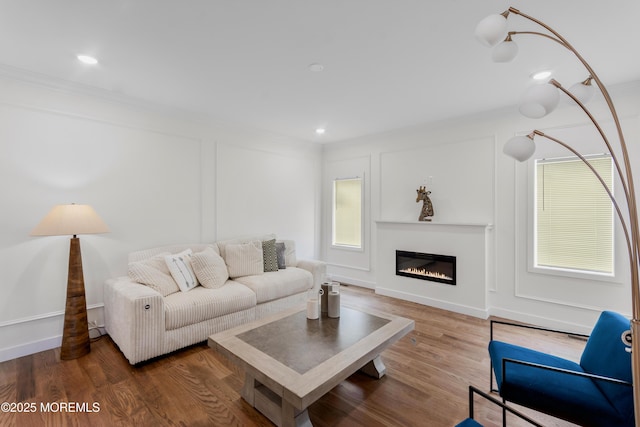 14 New Brunswick Ave, Matawan, NJ 07747 - living room with a glass covered fireplace, wood finished floors, and ornamental molding