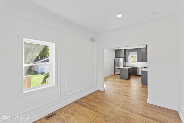 14 New Brunswick Ave, Matawan, NJ 07747 - unfurnished living room featuring crown molding, light wood-style flooring, and recessed lighting