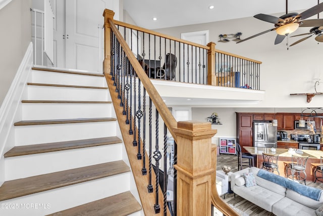 36 Joy Rd, Manahawkin, NJ 08050 - staircase featuring ceiling fan, a high ceiling, and recessed lighting