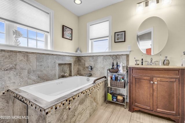 36 Joy Rd, Manahawkin, NJ 08050 - bathroom with healthy amount of natural light, vanity, and a bath