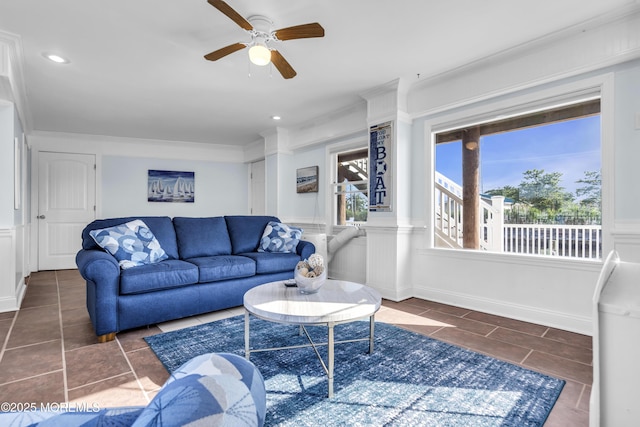 36 Joy Rd, Manahawkin, NJ 08050 - tiled living room with a ceiling fan, crown molding, recessed lighting, and wainscoting