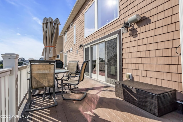36 Joy Rd, Manahawkin, NJ 08050 - wooden terrace with french doors and outdoor dining space