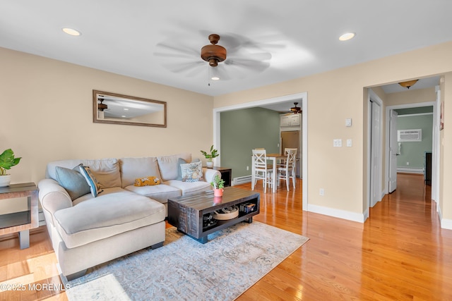 720 Ocean Ave Unit 8, Long Branch, NJ 07740 - living room featuring ceiling fan, recessed lighting, light wood-style flooring, a wall mounted AC, and a baseboard heating unit