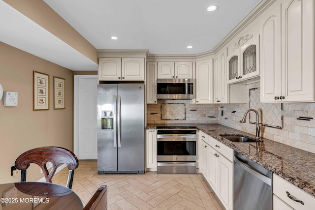 22 Tara Lin Dr, Hazlet, NJ 07730 - kitchen with stainless steel appliances, dark stone countertops, tasteful backsplash, glass insert cabinets, and recessed lighting
