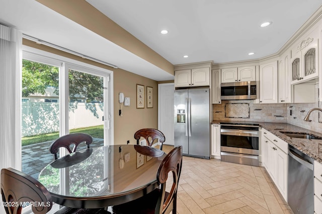 22 Tara Lin Dr, Hazlet, NJ 07730 - kitchen with stainless steel appliances, light stone counters, tasteful backsplash, and recessed lighting
