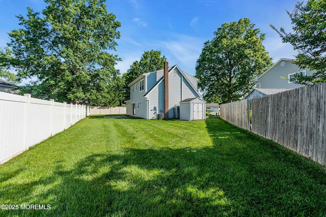 22 Tara Lin Dr, Hazlet, NJ 07730 - fenced backyard featuring a storage unit
