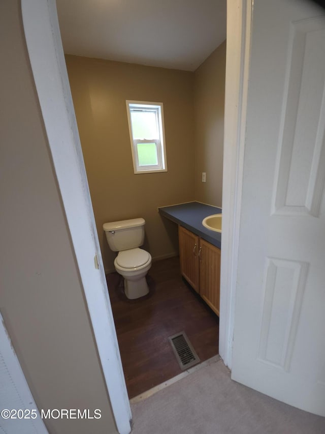 76 Secretariat St Unit 68, Howell, NJ 07731 - half bath featuring vanity and wood finished floors
