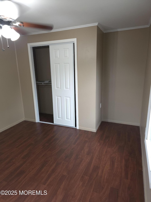 76 Secretariat St Unit 68, Howell, NJ 07731 - unfurnished bedroom with dark wood-type flooring, a closet, crown molding, and ceiling fan