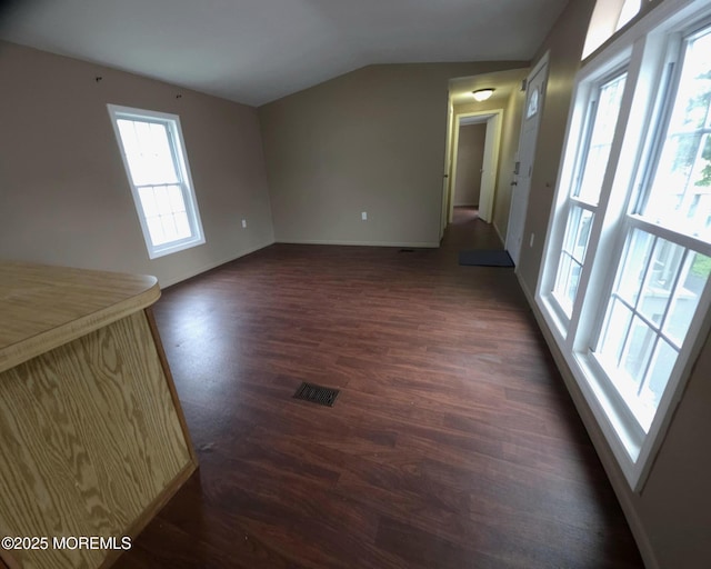 76 Secretariat St Unit 68, Howell, NJ 07731 - unfurnished living room featuring dark wood-style flooring and vaulted ceiling