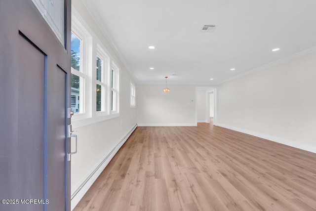 324 Barbados Dr N, Toms River, NJ 08757 - spare room with baseboard heating, ornamental molding, light wood-style floors, and recessed lighting