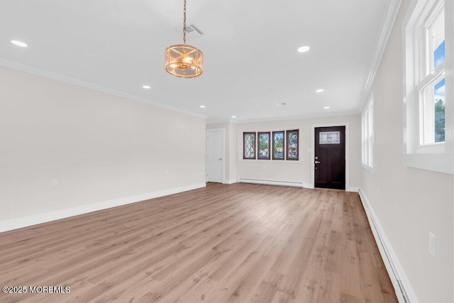 324 Barbados Dr N, Toms River, NJ 08757 - unfurnished living room with a baseboard heating unit, crown molding, healthy amount of natural light, light wood-style flooring, and recessed lighting