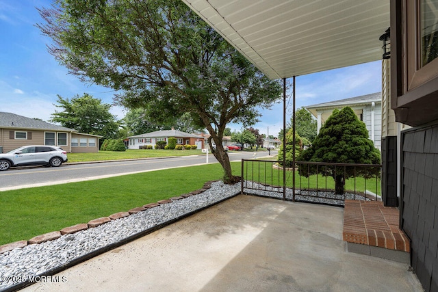 324 Barbados Dr N, Toms River, NJ 08757 - covered porch featuring a yard and a residential view