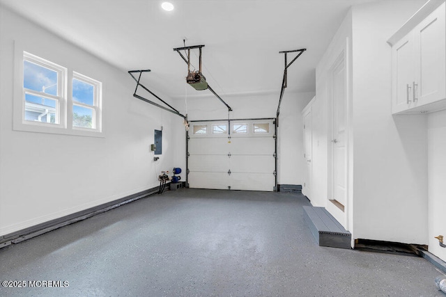 324 Barbados Dr N, Toms River, NJ 08757 - garage with a garage door opener and electric panel