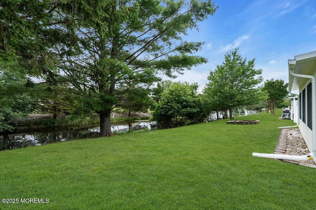 324 Barbados Dr N, Toms River, NJ 08757 - view of grassy yard featuring a water view