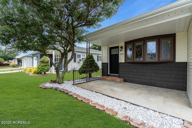 324 Barbados Dr N, Toms River, NJ 08757 - doorway to property with a lawn