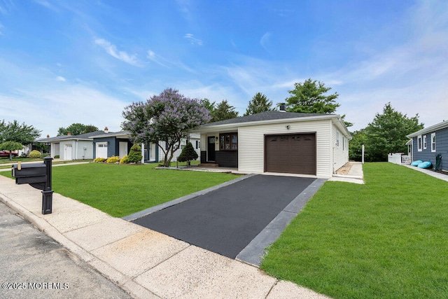 324 Barbados Dr N, Toms River, NJ 08757 - ranch-style house featuring driveway, an attached garage, and a front lawn