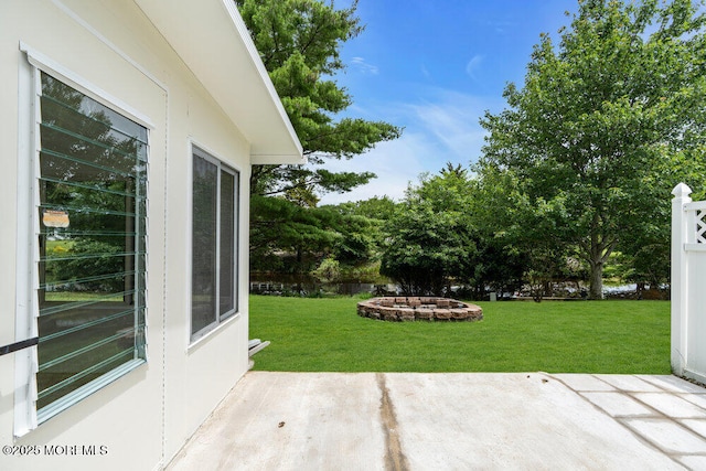 324 Barbados Dr N, Toms River, NJ 08757 - view of green lawn with a patio