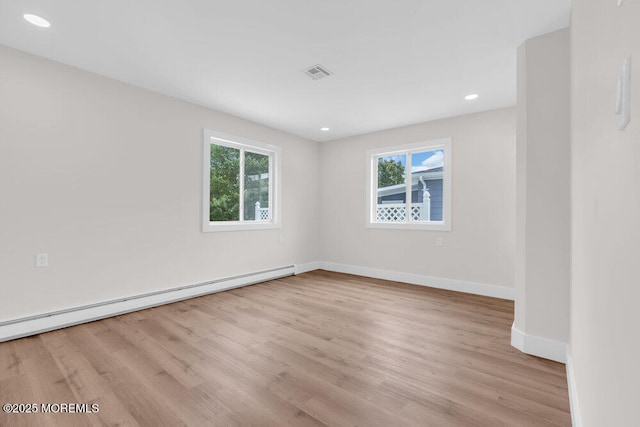 324 Barbados Dr N, Toms River, NJ 08757 - spare room featuring a baseboard heating unit, light wood-style floors, and recessed lighting