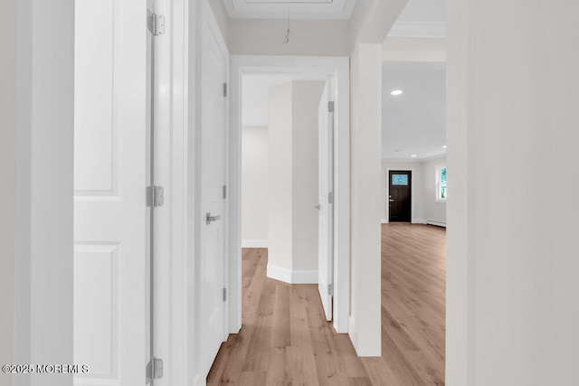 324 Barbados Dr N, Toms River, NJ 08757 - corridor featuring light wood-style floors, attic access, ornamental molding, and baseboard heating
