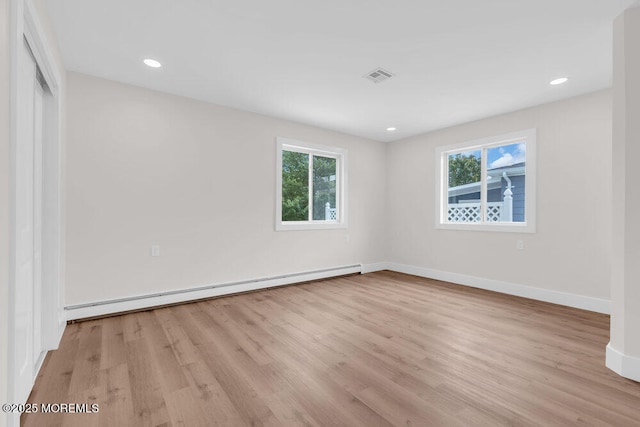 324 Barbados Dr N, Toms River, NJ 08757 - unfurnished bedroom featuring baseboard heating, light wood finished floors, recessed lighting, and a closet