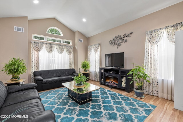 2 Moet Ct, Manchester, NJ 08759 - living area with wood finished floors and high vaulted ceiling