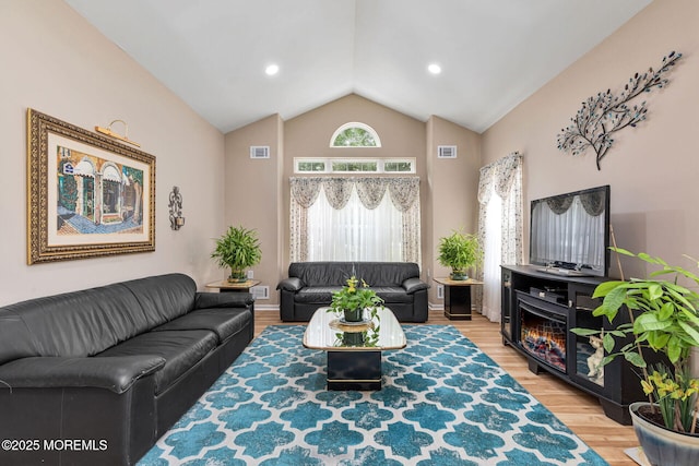2 Moet Ct, Manchester, NJ 08759 - living area with wood finished floors and high vaulted ceiling