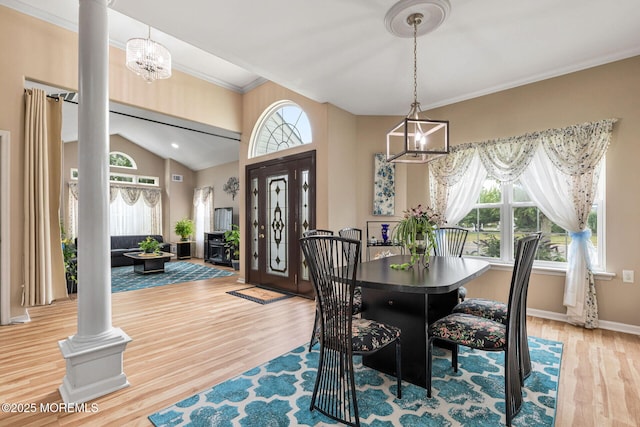 2 Moet Ct, Manchester, NJ 08759 - dining space with decorative columns, healthy amount of natural light, vaulted ceiling, and ornamental molding