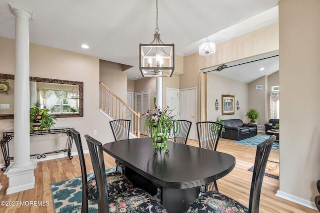 2 Moet Ct, Manchester, NJ 08759 - dining area with healthy amount of natural light, light wood finished floors, decorative columns, vaulted ceiling, and recessed lighting