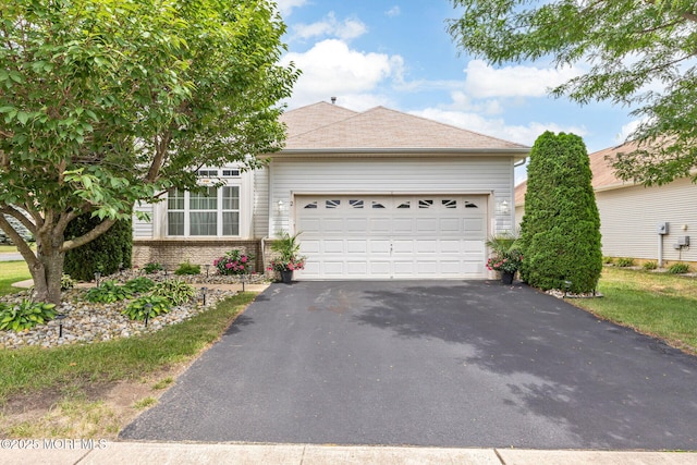 2 Moet Ct, Manchester, NJ 08759 - view of front of property with asphalt driveway, a garage, and roof with shingles