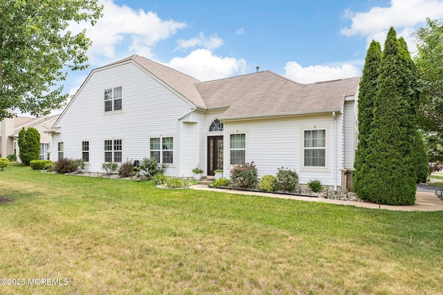 2 Moet Ct, Manchester, NJ 08759 - view of front of home featuring a front yard and roof with shingles