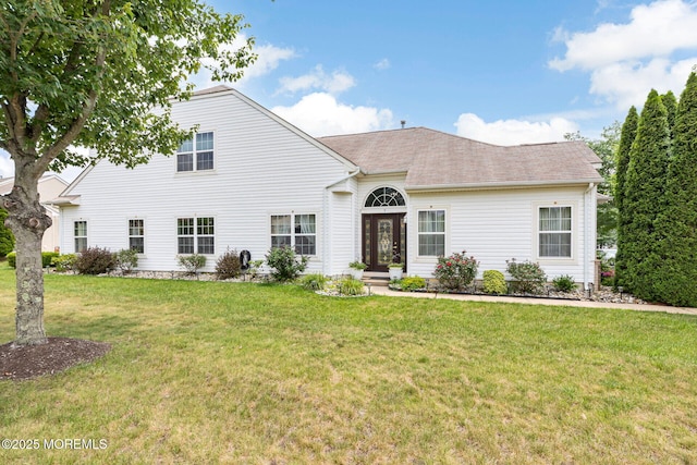 2 Moet Ct, Manchester, NJ 08759 - view of front of home with a front yard and a shingled roof