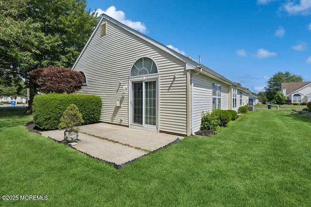 2525 Spring Hill Dr, Toms River, NJ 08755 - back of house with a patio and a lawn