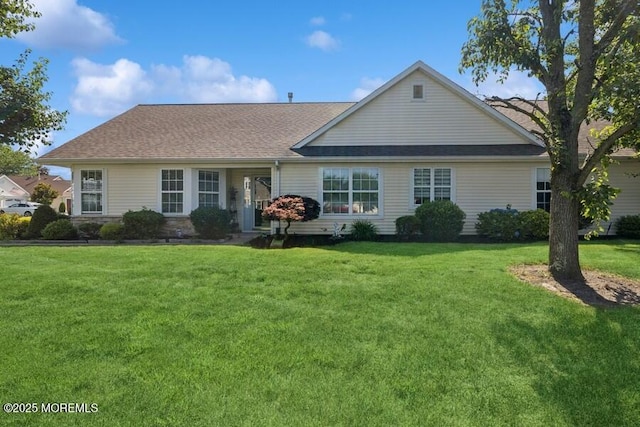 2525 Spring Hill Dr, Toms River, NJ 08755 - view of front of house with a front yard and roof with shingles