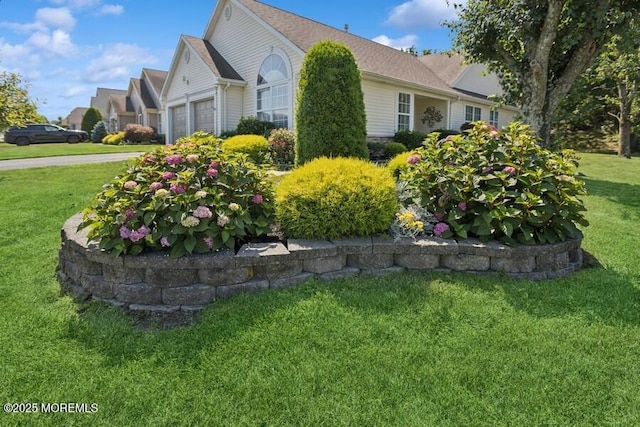 2525 Spring Hill Dr, Toms River, NJ 08755 - view of home's exterior with an attached garage and a yard
