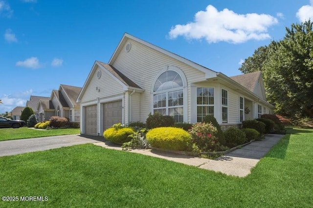 2525 Spring Hill Dr, Toms River, NJ 08755 - view of property exterior featuring concrete driveway, an attached garage, and a lawn