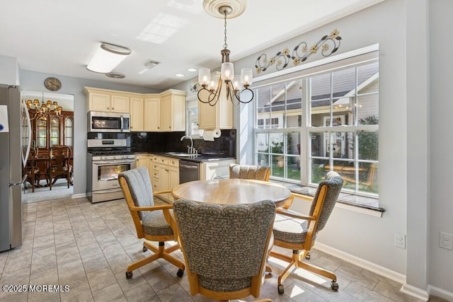 2525 Spring Hill Dr, Toms River, NJ 08755 - dining space featuring a chandelier and plenty of natural light
