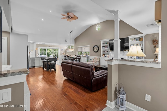 98 Yorkwood Dr, Brick, NJ 08723 - living room with decorative columns, ceiling fan, wood finished floors, high vaulted ceiling, and recessed lighting
