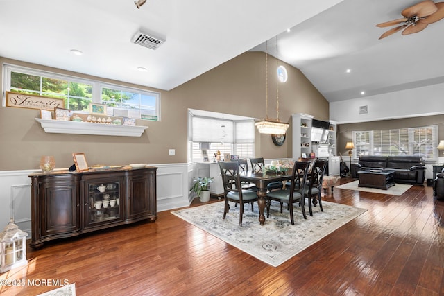 98 Yorkwood Dr, Brick, NJ 08723 - dining area featuring a ceiling fan, wainscoting, wood-type flooring, high vaulted ceiling, and a decorative wall