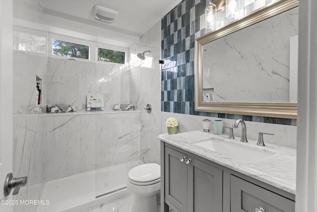 98 Yorkwood Dr, Brick, NJ 08723 - full bathroom featuring vanity, a marble finish shower, and tile walls