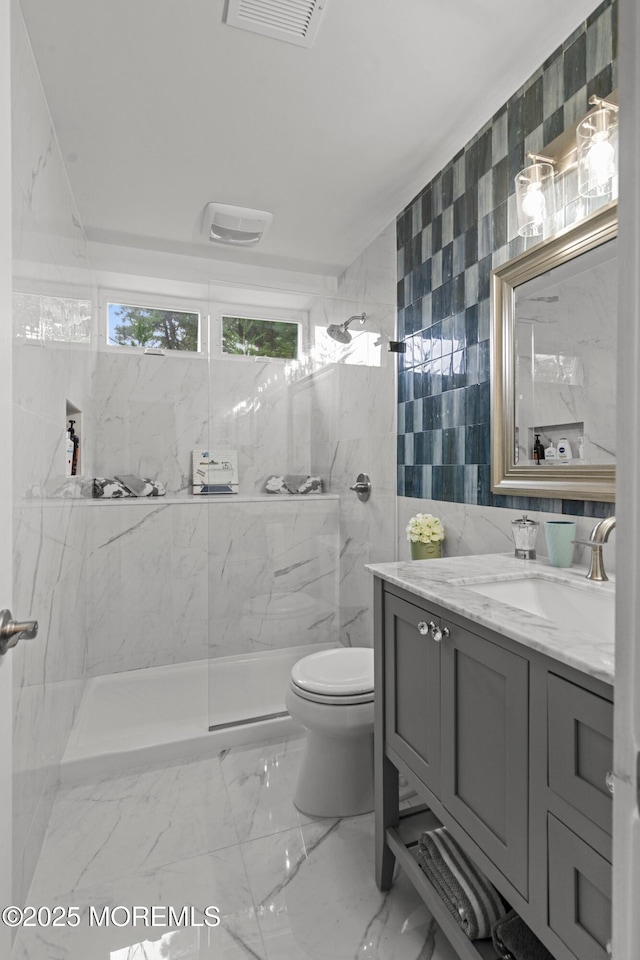 98 Yorkwood Dr, Brick, NJ 08723 - full bathroom featuring tile walls, vanity, a marble finish shower, and marble finish flooring