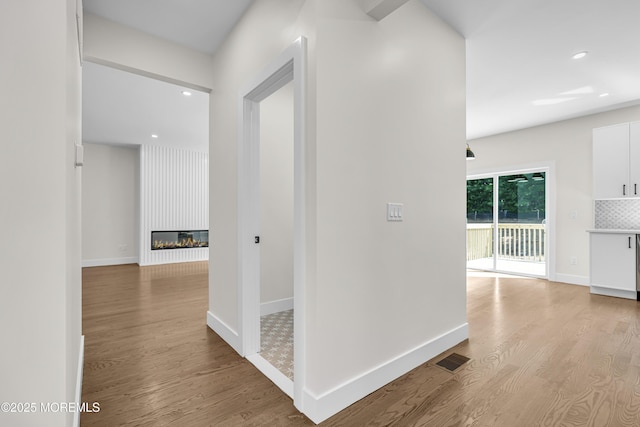 21 Pension Hill Rd, Manalapan, NJ 07726 - hall with wood finished floors and recessed lighting