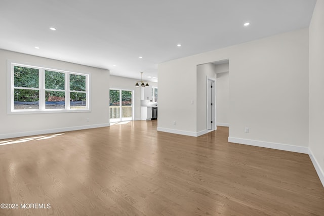 21 Pension Hill Rd, Manalapan, NJ 07726 - unfurnished living room featuring wood finished floors and recessed lighting