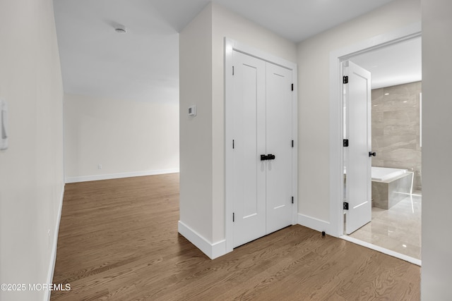 21 Pension Hill Rd, Manalapan, NJ 07726 - hall with wood finished floors and baseboards