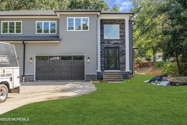21 Pension Hill Rd, Manalapan, NJ 07726 - view of front of home with dirt driveway, a garage, a front lawn, and stone siding